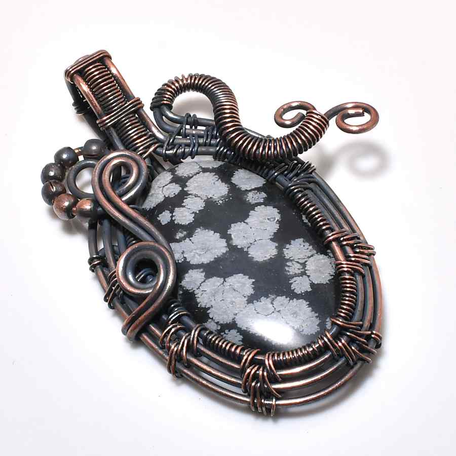 Serenity’s Embrace – Snowflake Obsidian Copper Pendant