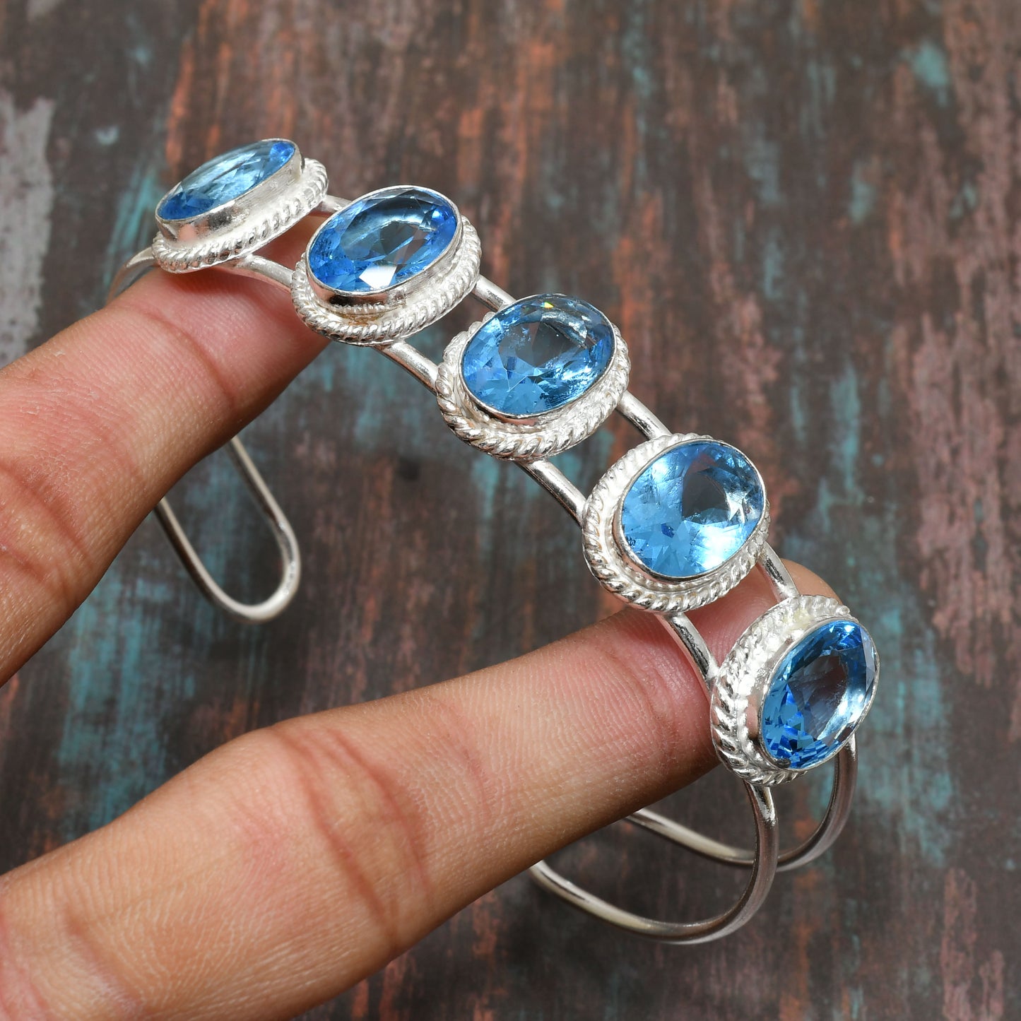 Azure Blossom – Sterling Silver Blue Topaz Bracelet