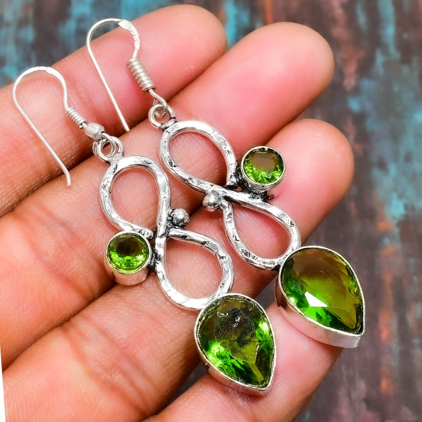 Liora’s Loop – Sterling Silver Peridot Infinity Earrings