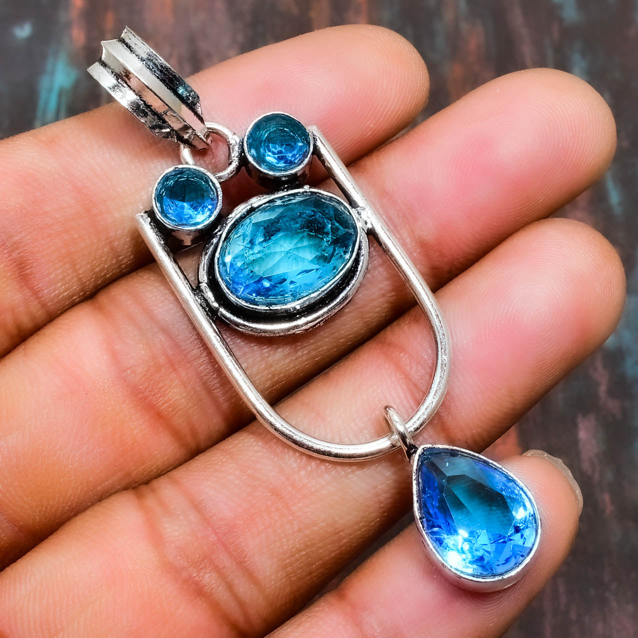 Azure Harmony – Blue Topaz Sterling Silver Pendant