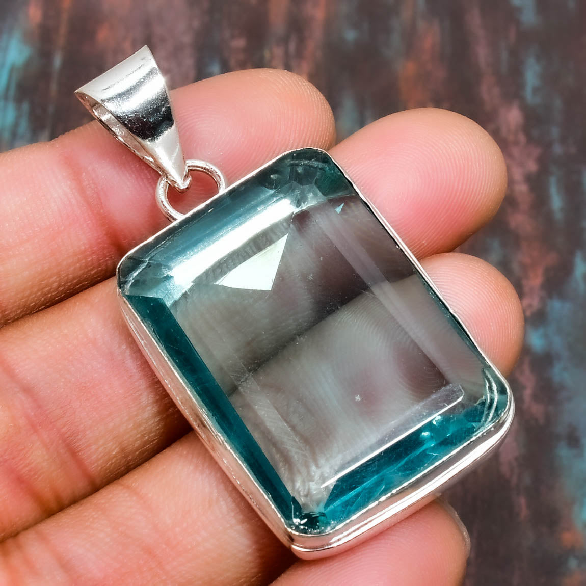 Ocean’s Embrace – Teal Gemstone Sterling Silver Pendant