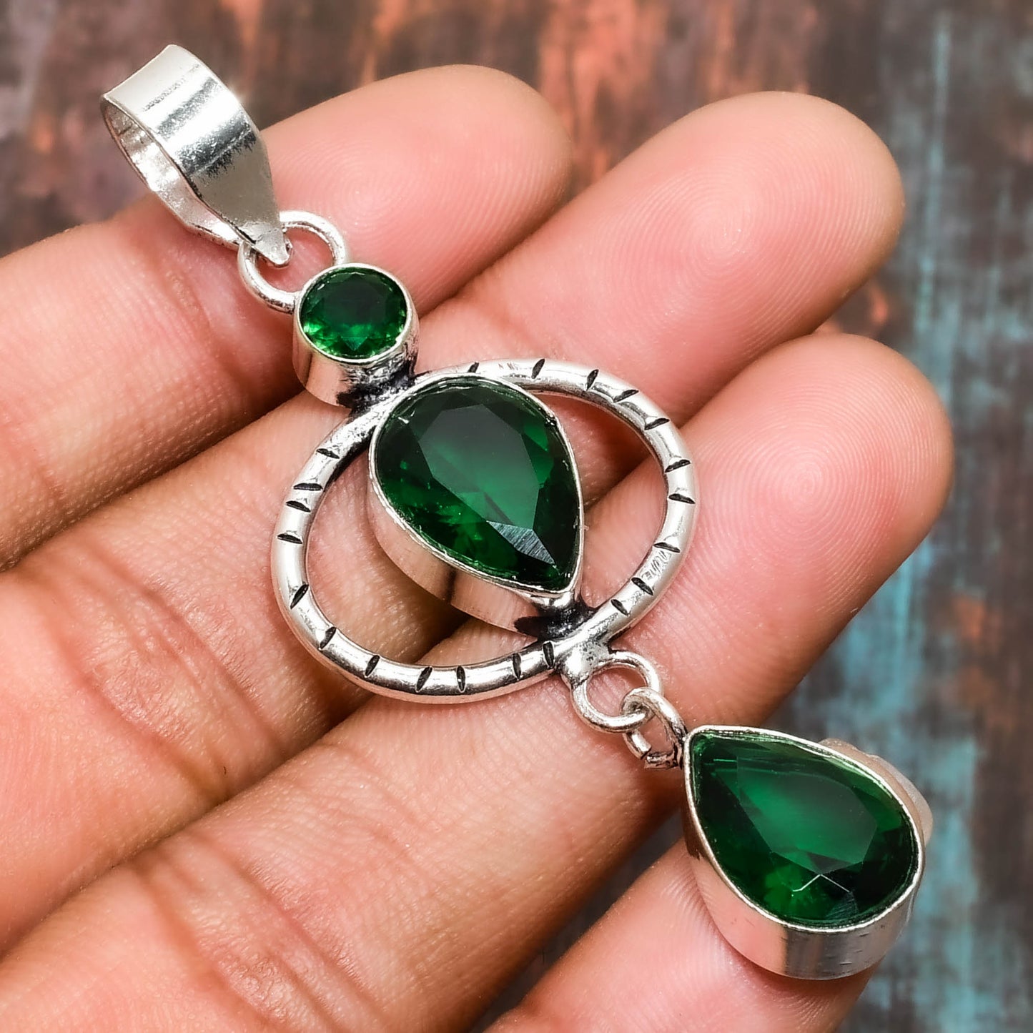 Nature’s Embrace – Emerald & Silver Pendant