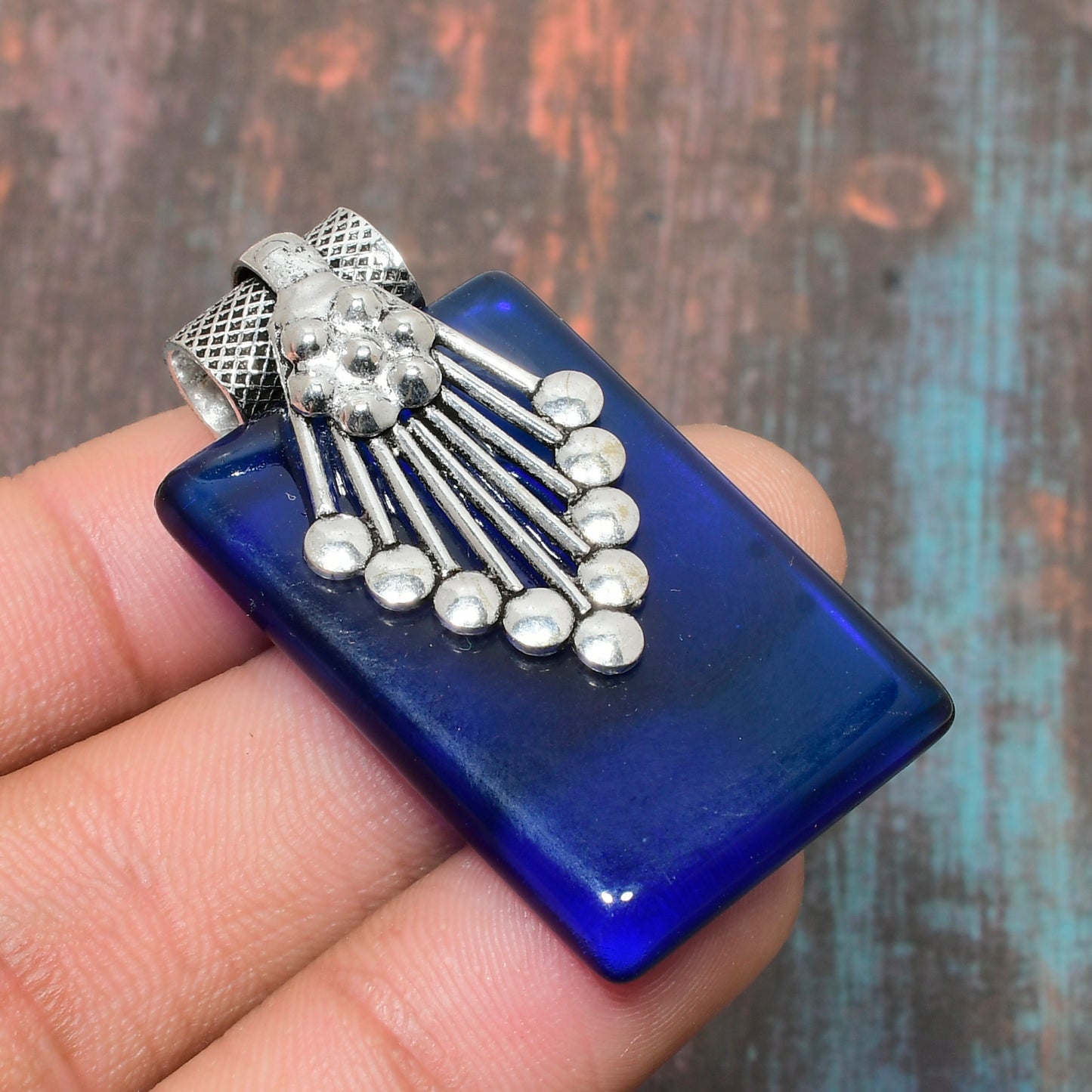 Serenade’s Charm – Blue Glass & Silver Pendant