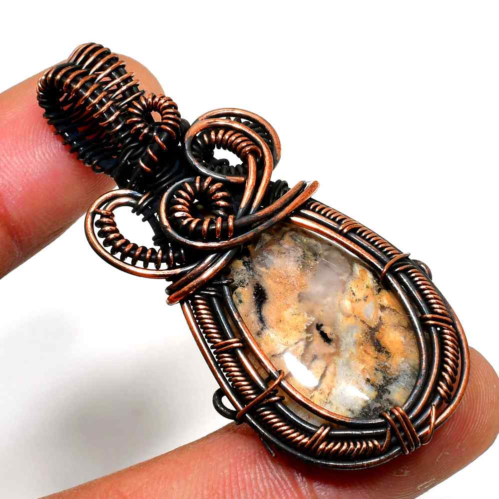 Serenity’s Veil – Copper-Wrapped Crystal Pendant