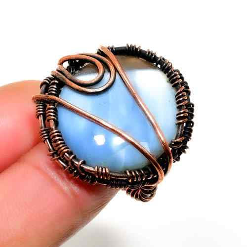 Serenity’s Embrace – Handwrapped Larimar & Copper Pendant