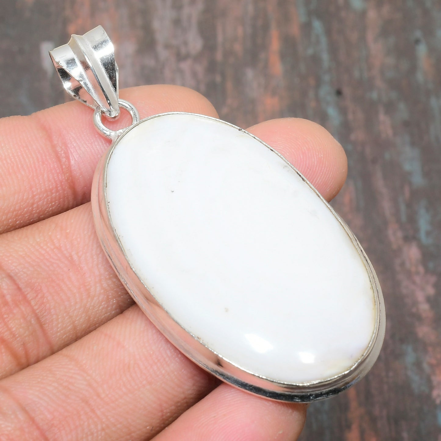 Serenity’s Embrace – White Stone Silver Pendant