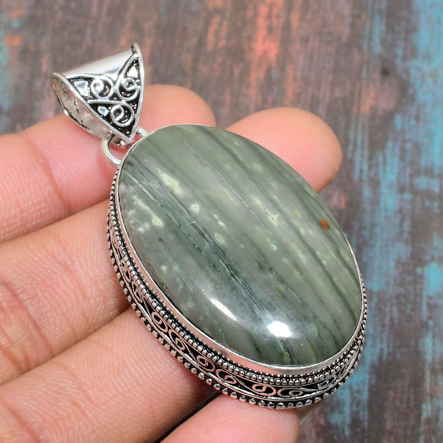 Earth’s Serenity – Serpentine & Silver Pendant