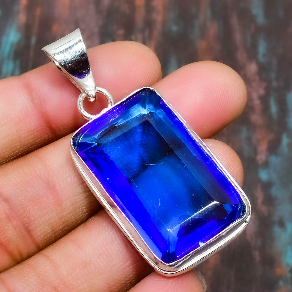 Serenity’s Embrace – Sapphire Sterling Silver Pendant
