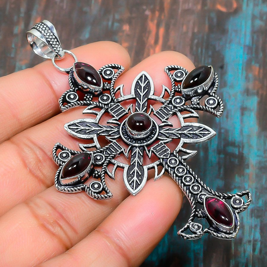 Ember’s Cross – Sterling Silver Garnet Pendant