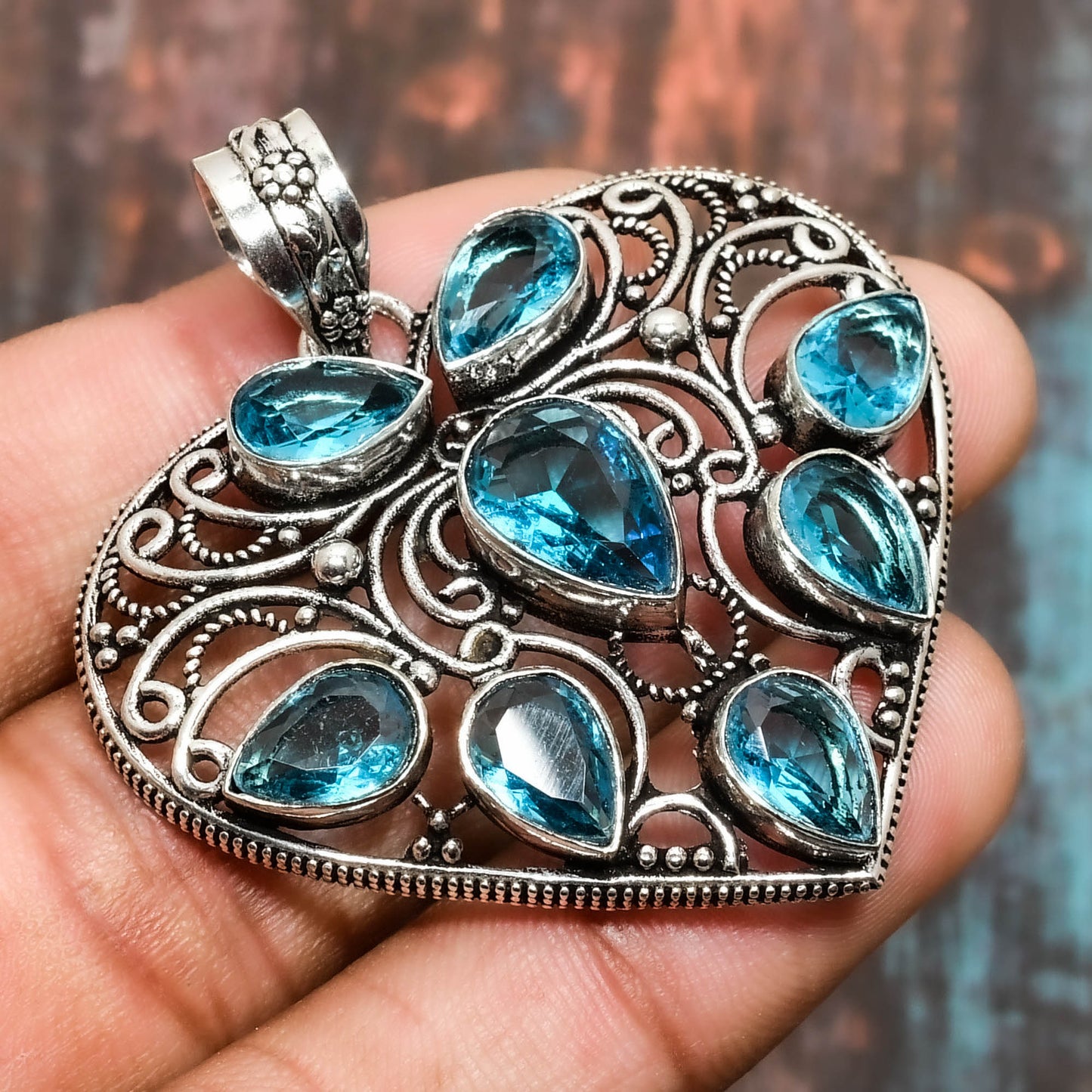 Harmony’s Heart – Blue Topaz & Filigree Silver Pendant