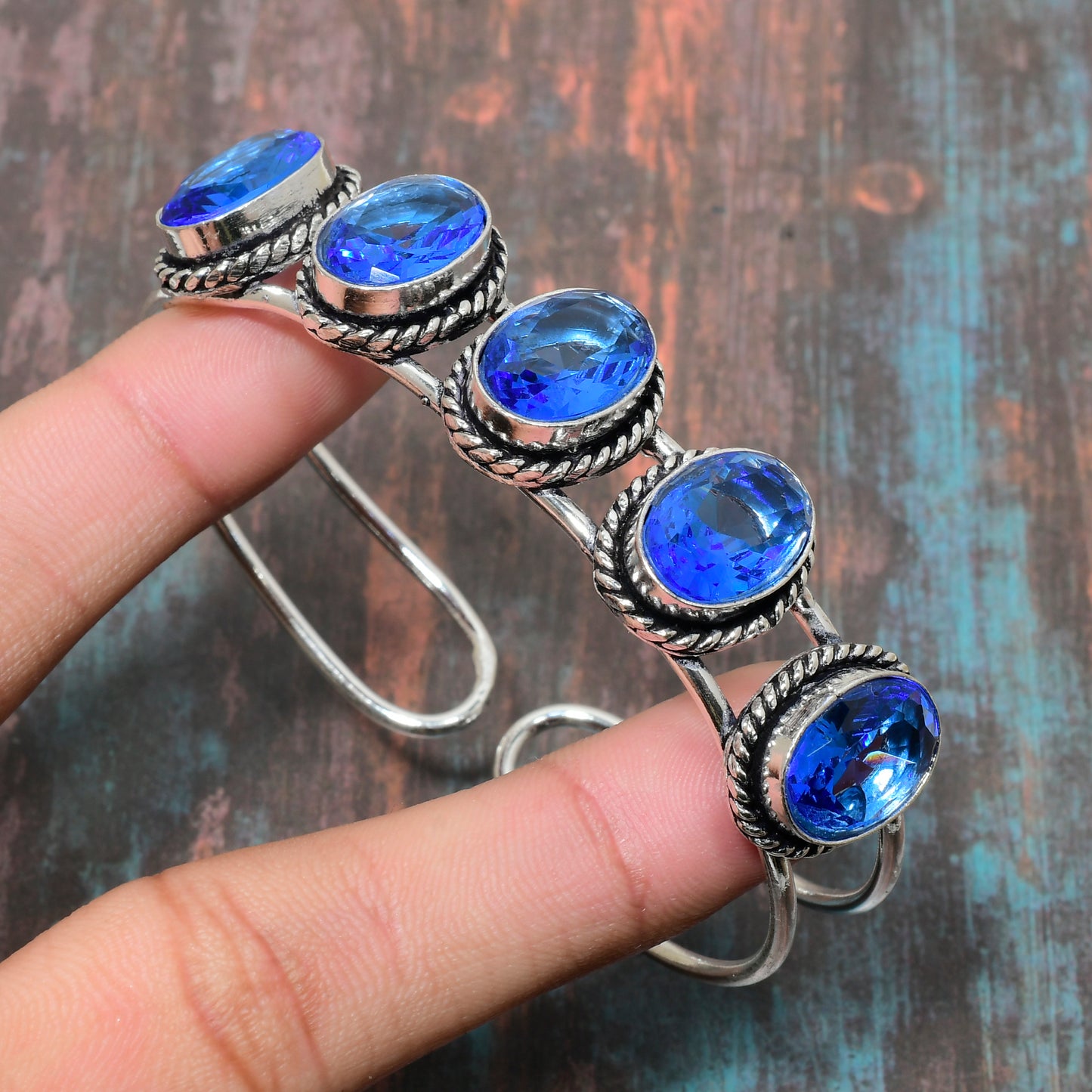 Ocean’s Embrace – Blue Topaz Sterling Silver Cuff