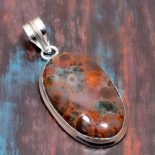 Terra’s Embrace – Red Jasper Sterling Silver Pendant