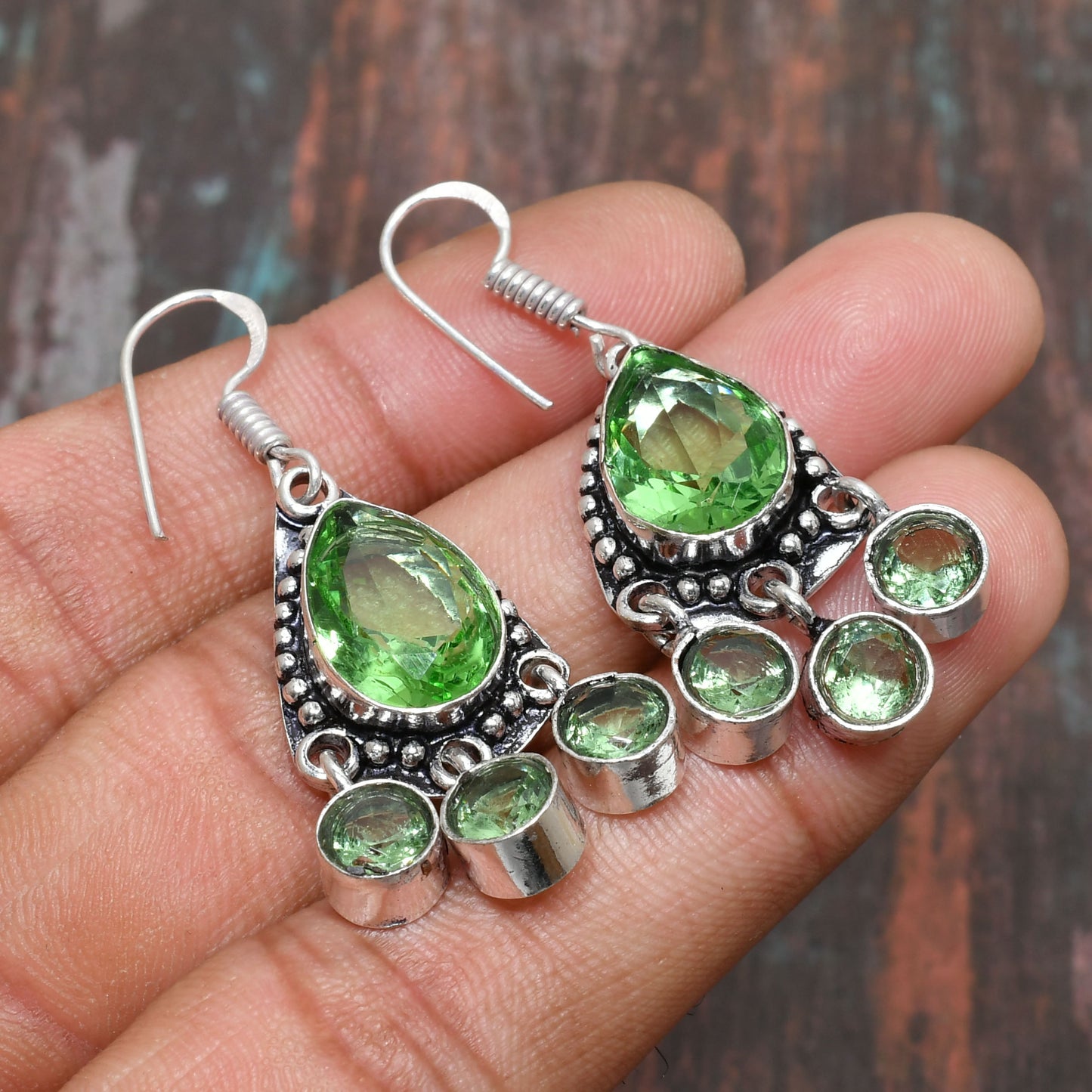 Aurora’s Renewal – Sterling Silver Peridot Earrings