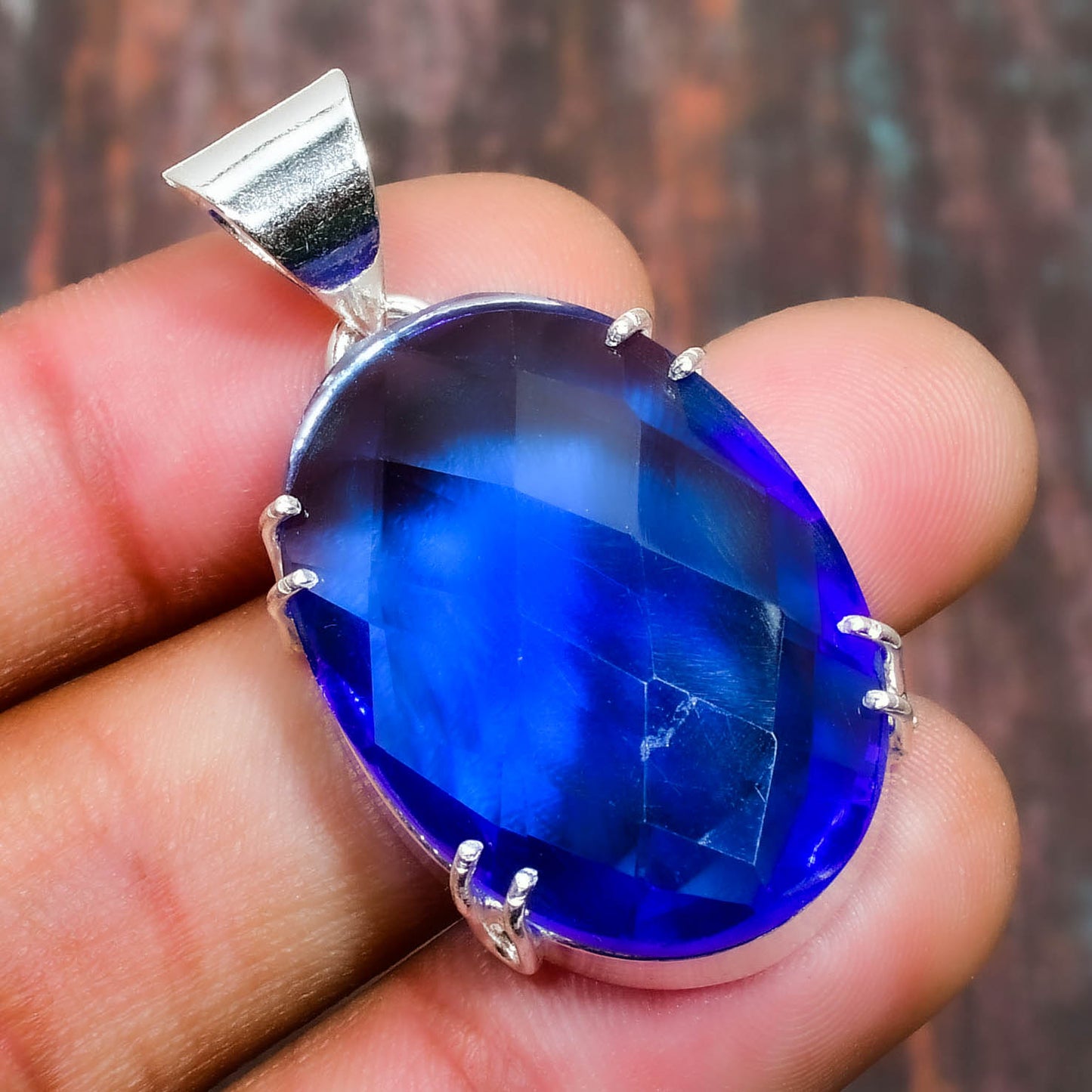 Royal Radiance – Blue Topaz & Sterling Silver Pendant