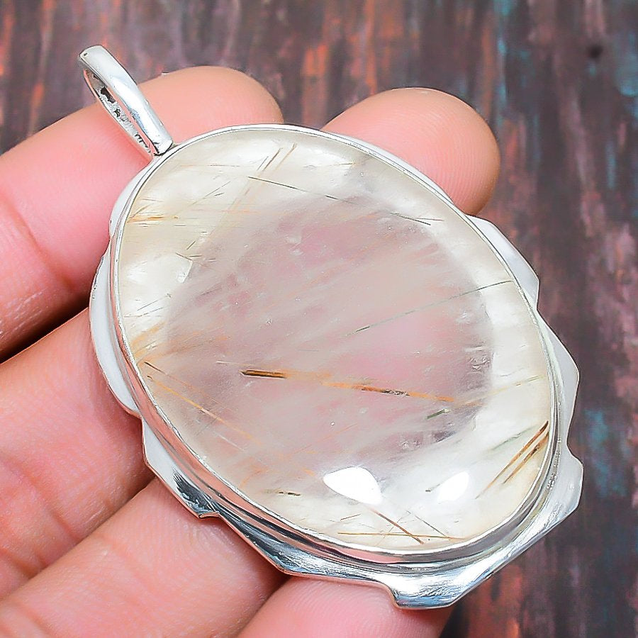 Clarity’s Radiance – Sterling Silver Rutile Quartz Pendant