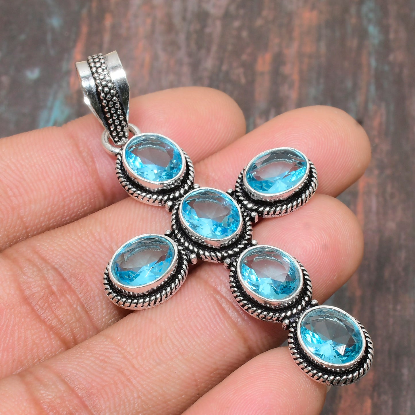 Ocean’s Grace – Aquamarine & Sterling Silver Cross Pendant