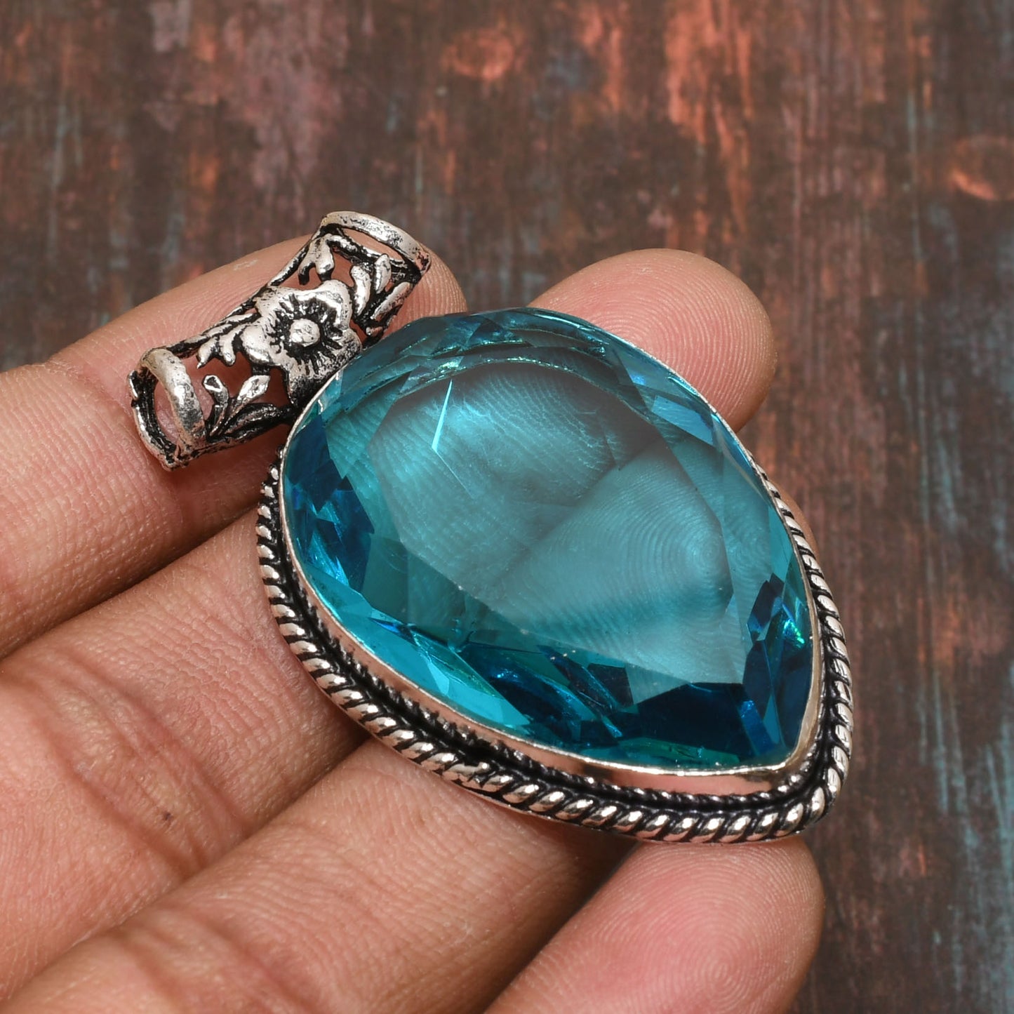 Azure’s Clarity – Blue Topaz Sterling Silver Pendant