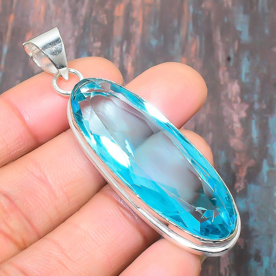 Ocean’s Embrace – Aquamarine Sterling Silver Pendant
