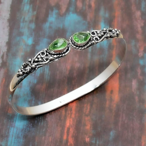 Ember’s Embrace – Sterling Silver Peridot Bracelet