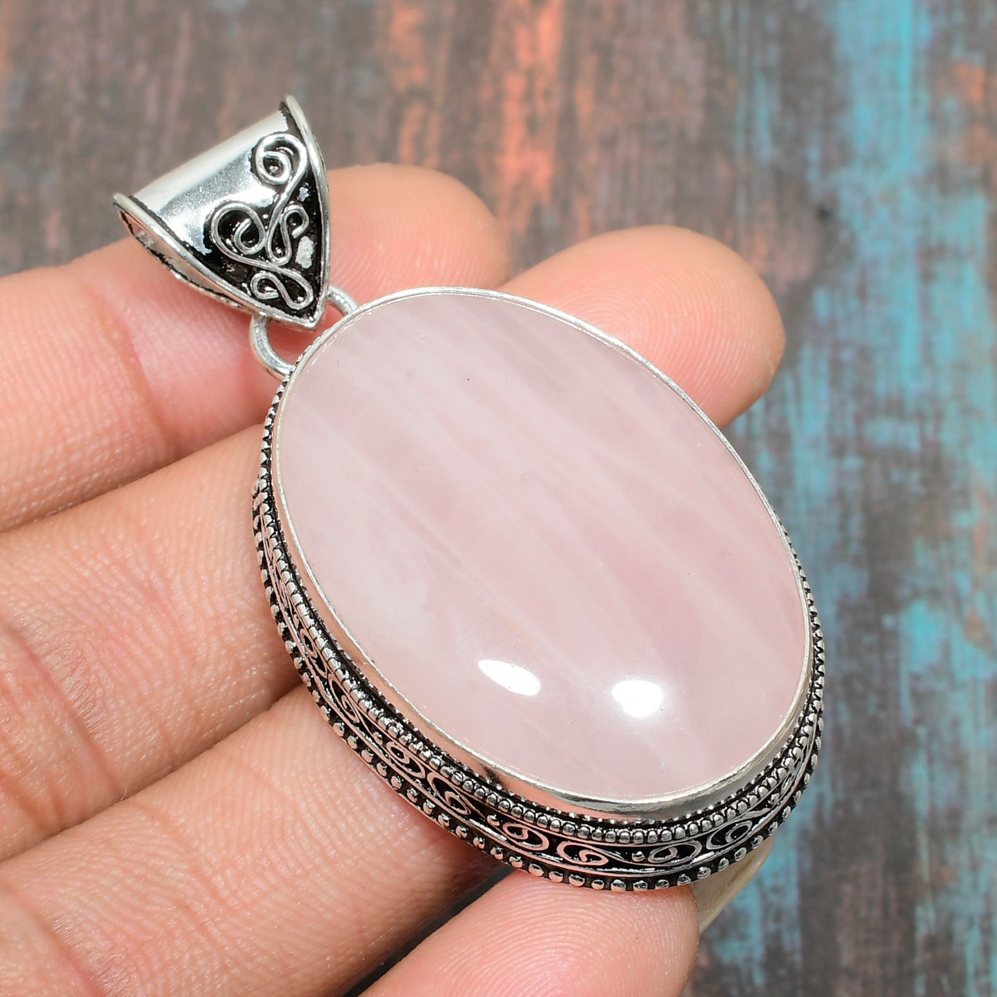 Serenity’s Embrace – Rose Quartz Silver Filigree Pendant
