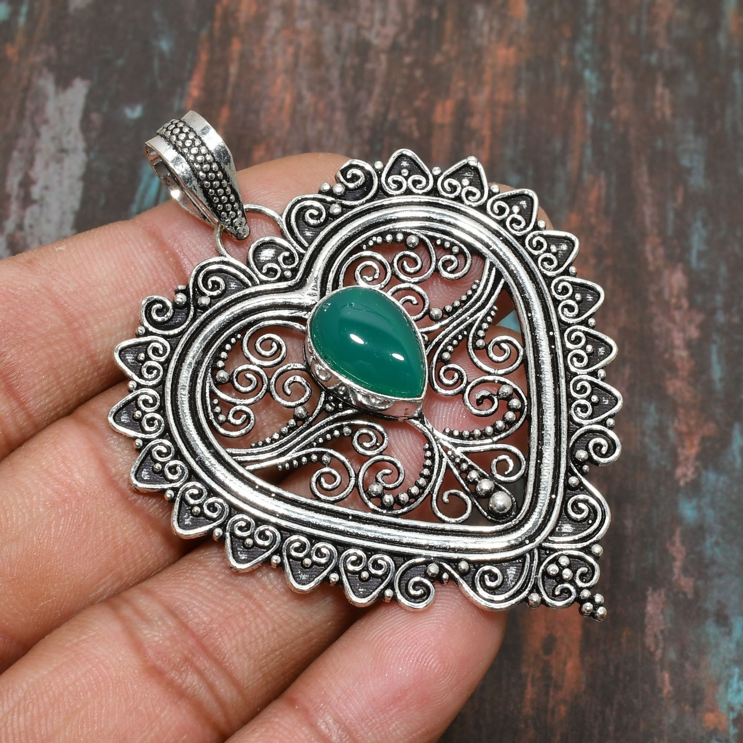 Emerald Embrace – Sterling Silver Heart Pendant