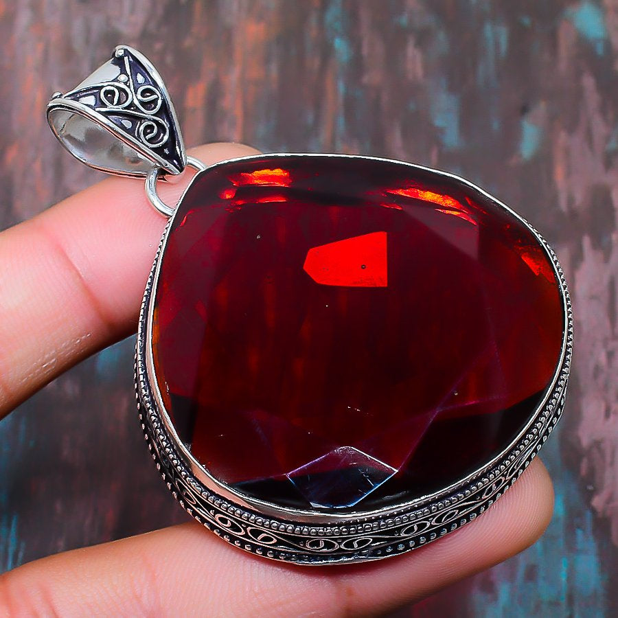 Ember’s Whisper – Garnet Silver Pendant