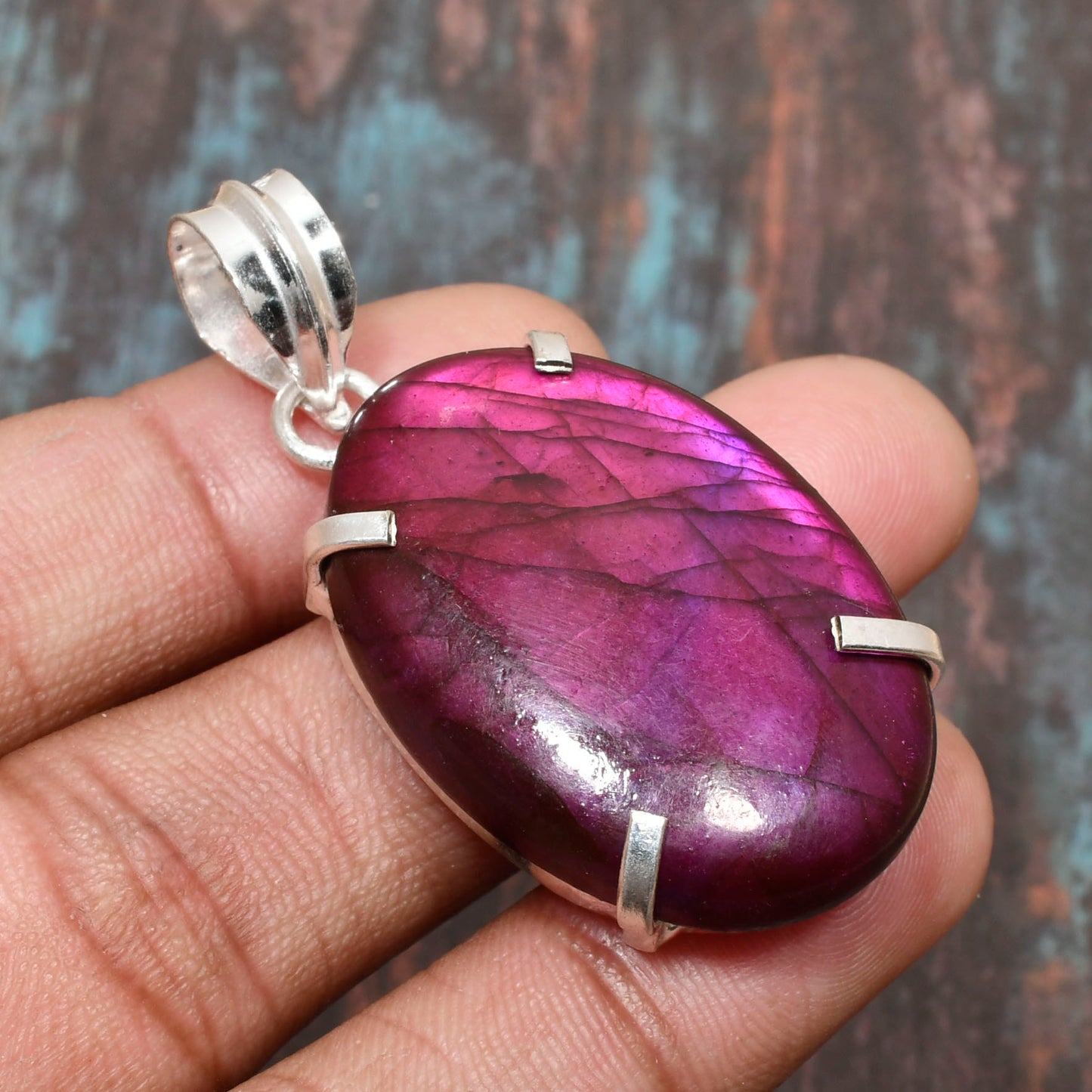 Ember’s Embrace – Sterling Silver Ruby Pendant