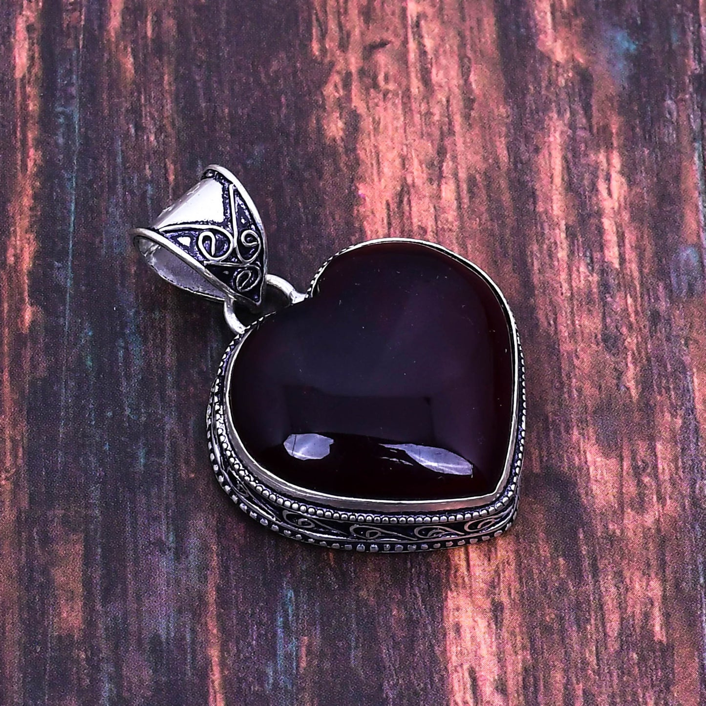Emberheart – Garnet Sterling Silver Heart Pendant
