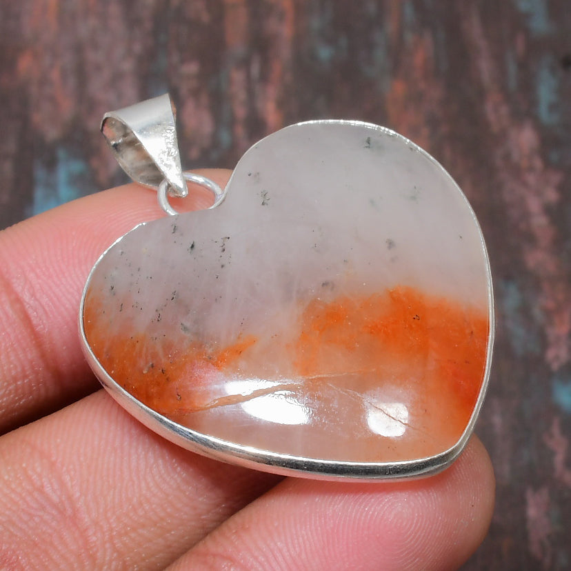 Ember’s Embrace – Sunstone Heart Pendant