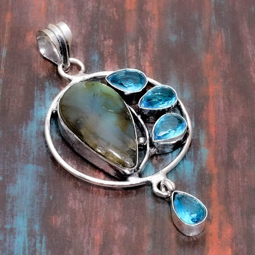 Celeste’s Radiance – Labradorite & Blue Topaz Pendant