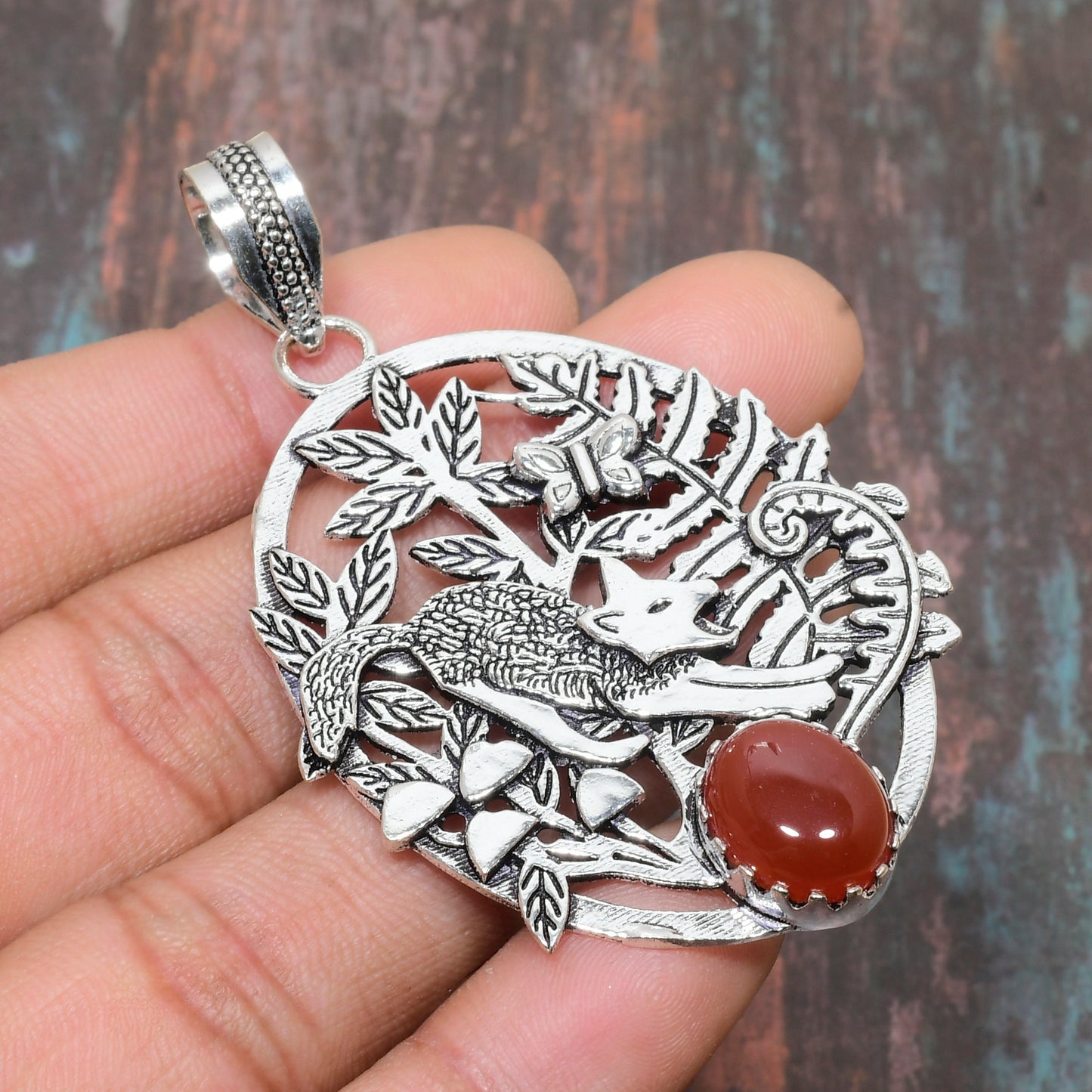 Ember’s Whisper – Carnelian Fox Pendant