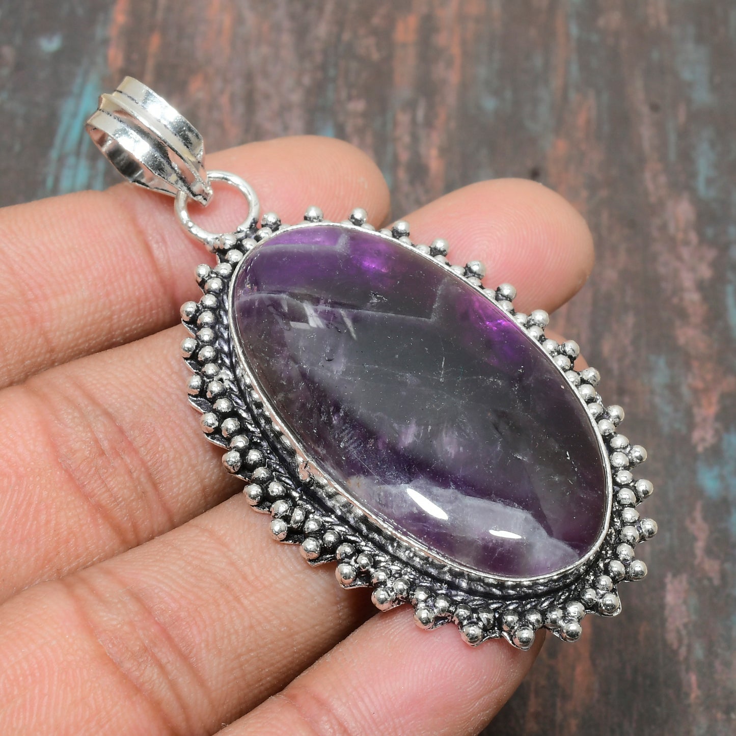 Celestial Harmony – Silver-Wrapped Amethyst Pendant