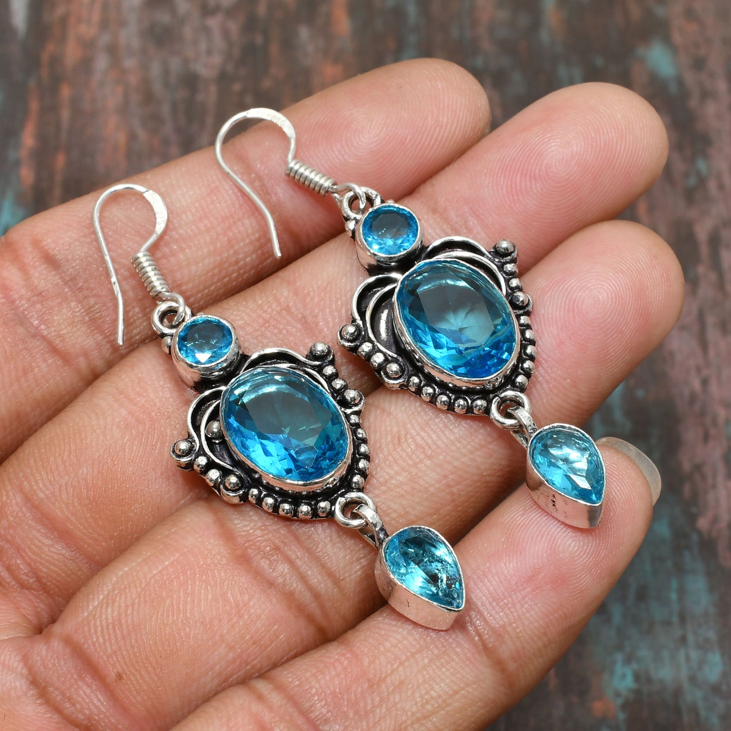 Ocean’s Clarity – Sterling Silver Blue Topaz Earrings