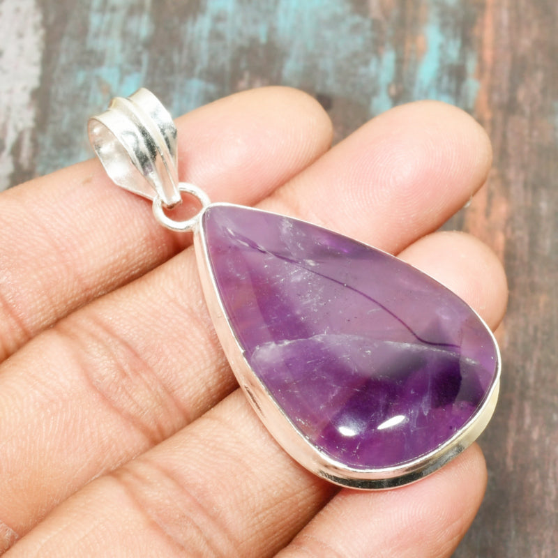 Ezra’s Veil – Silver-Wrapped Amethyst Pendant