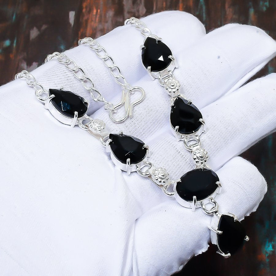 Onyx Sentinel – Silver-Accent Bracelet