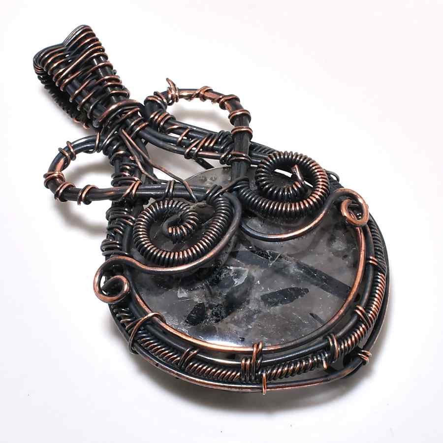 Enigma Pendant – Raw Quartz in Black Wire
