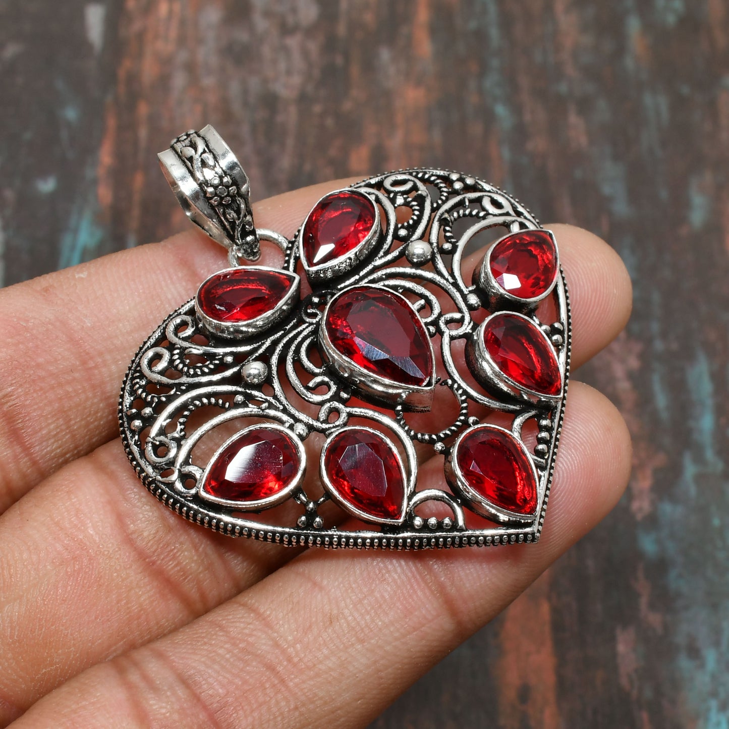 Heart’s Embrace – Sterling Silver Red Gemstone Pendant