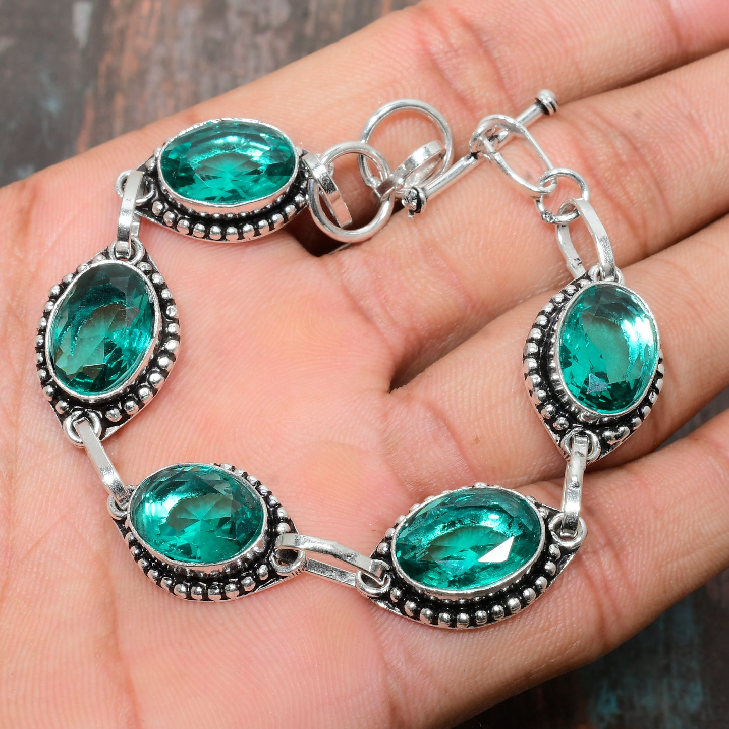 Emerald Embrace – Sterling Silver Bracelet