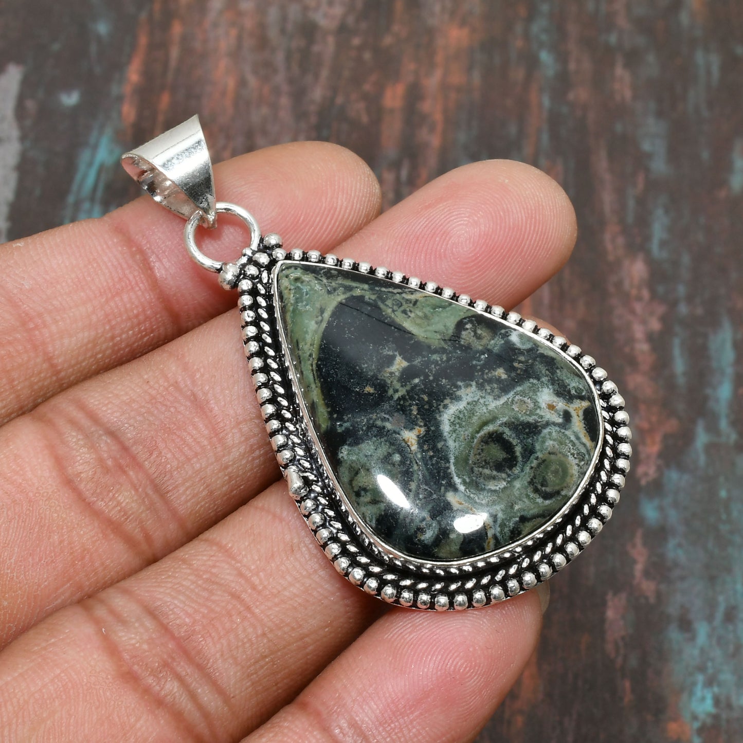 Gaia’s Embrace – Natural Stone & Silver Pendant