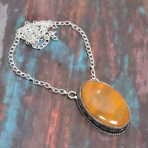 Ember’s Embrace – Silver Amber Pendant