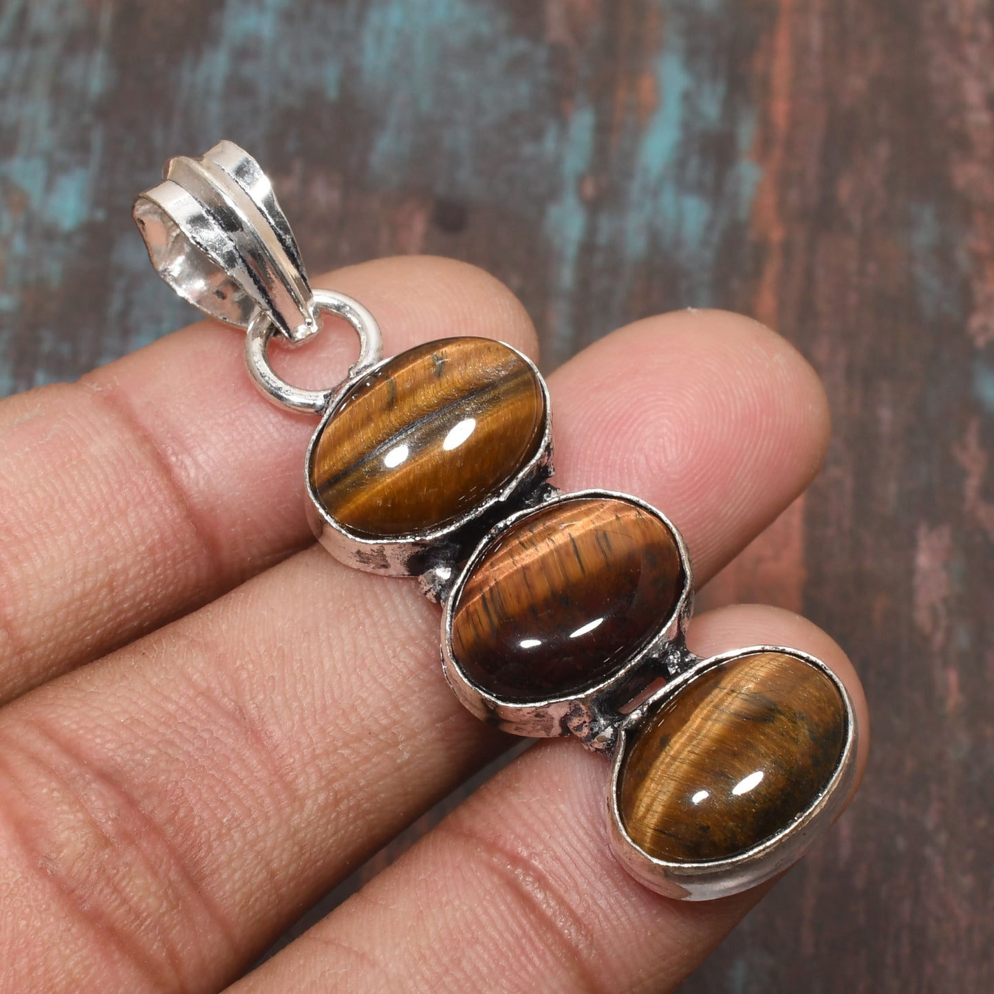 Valor’s Embrace – Triple Tiger’s Eye Silver Pendant