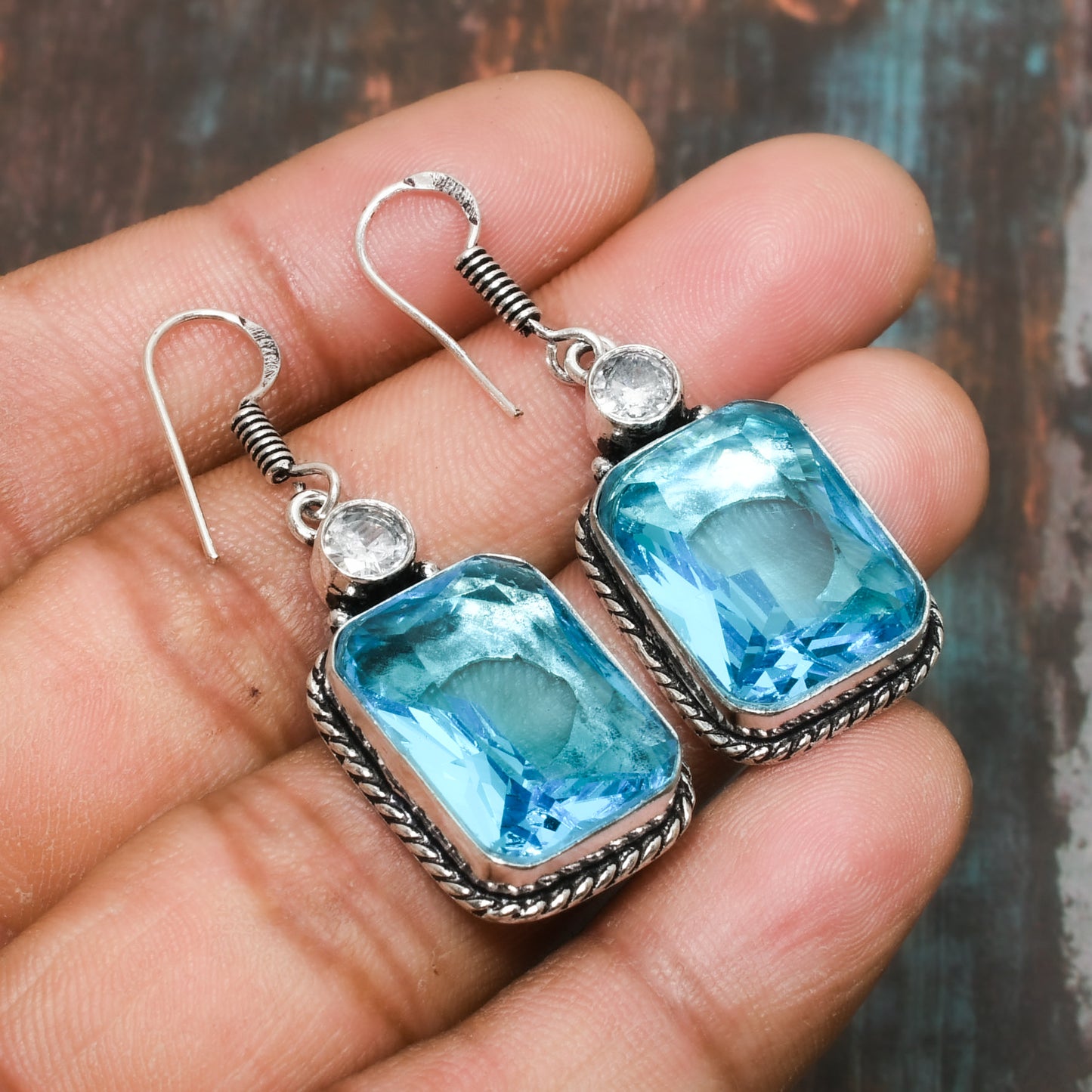 Azure Radiance – Sterling Silver Blue Topaz Earrings