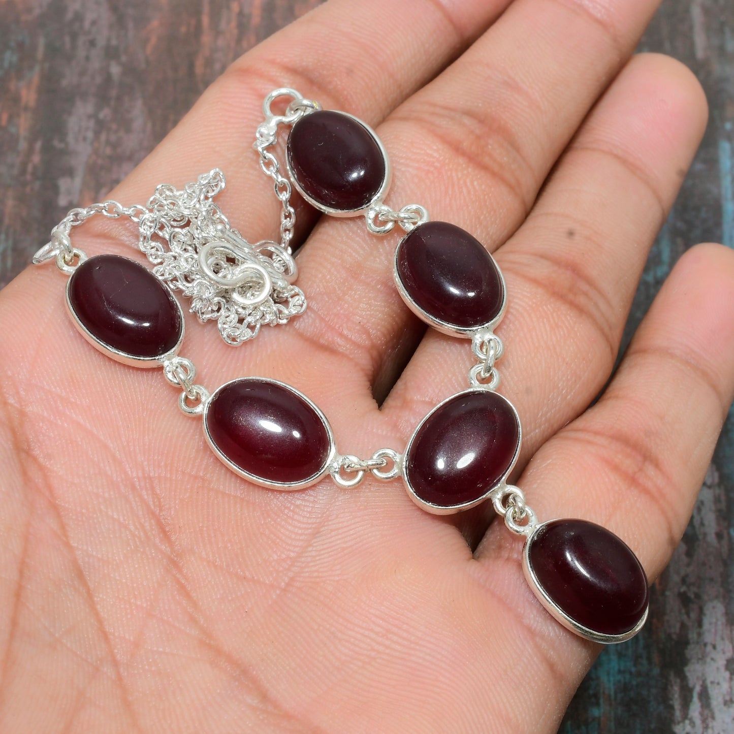 Ember’s Embrace – Sterling Silver Garnet Bracelet