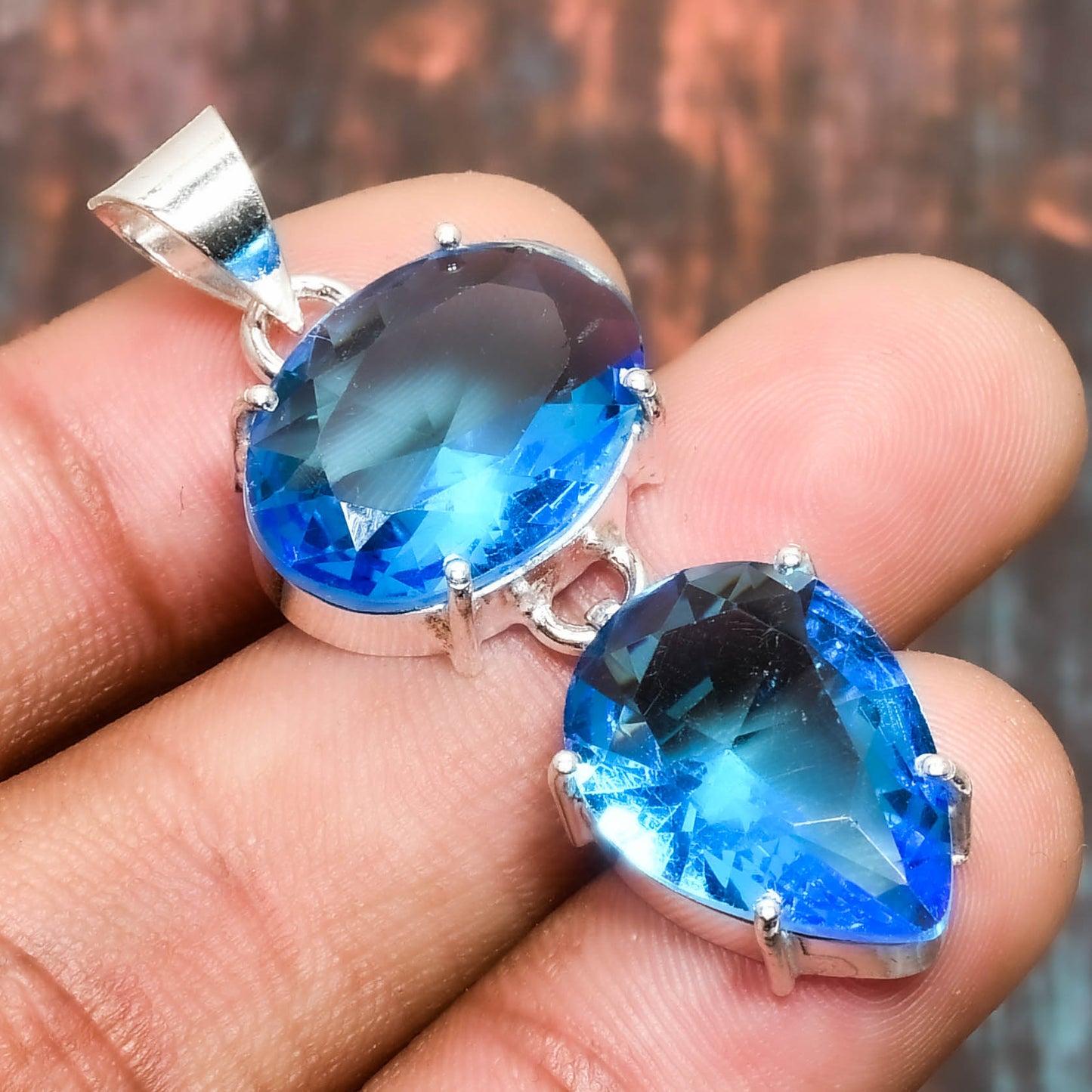 Ocean’s Embrace – Blue Topaz Sterling Silver Pendant