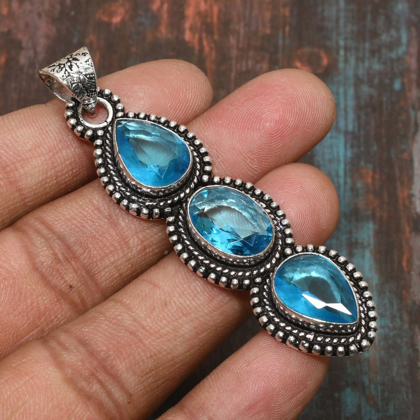 Azure Tranquility – Triple Blue Topaz Sterling Silver Pendant