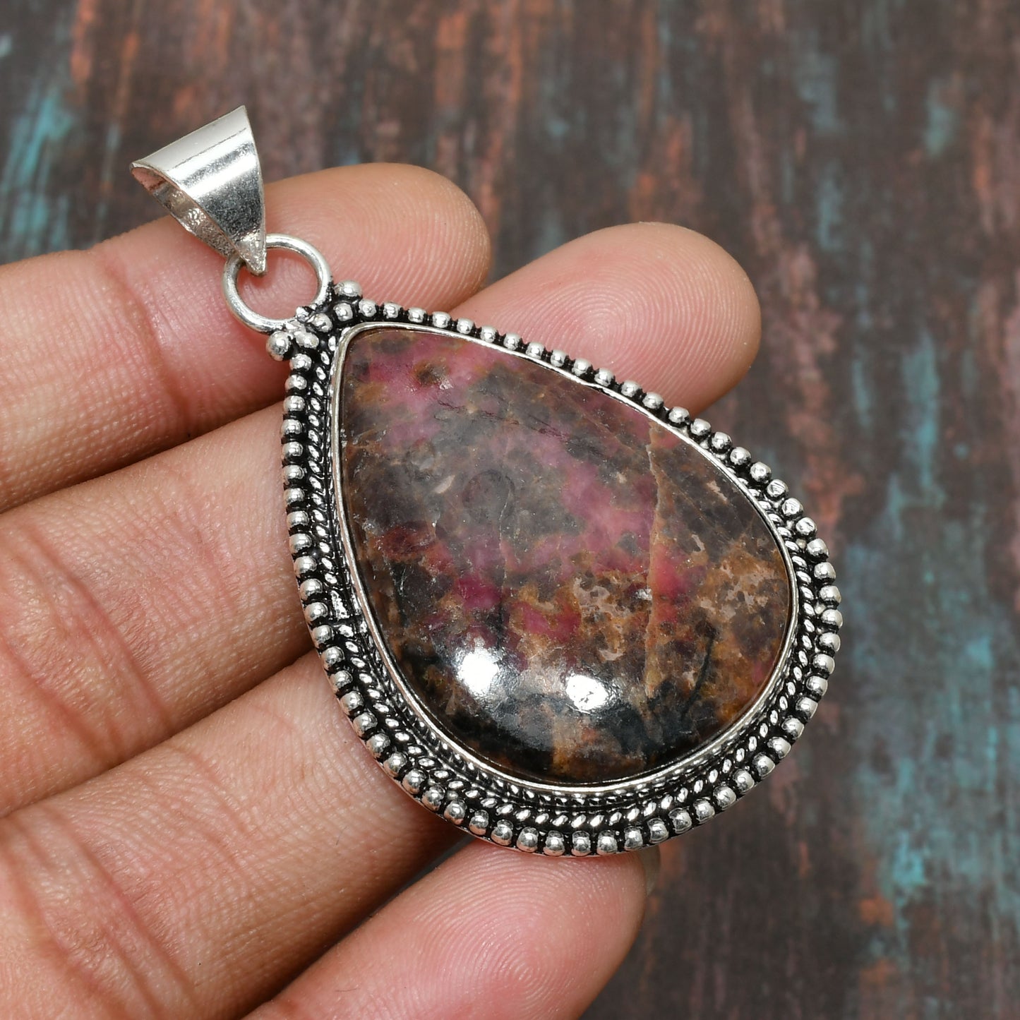 Ember’s Embrace – Ruby Sterling Silver Pendant