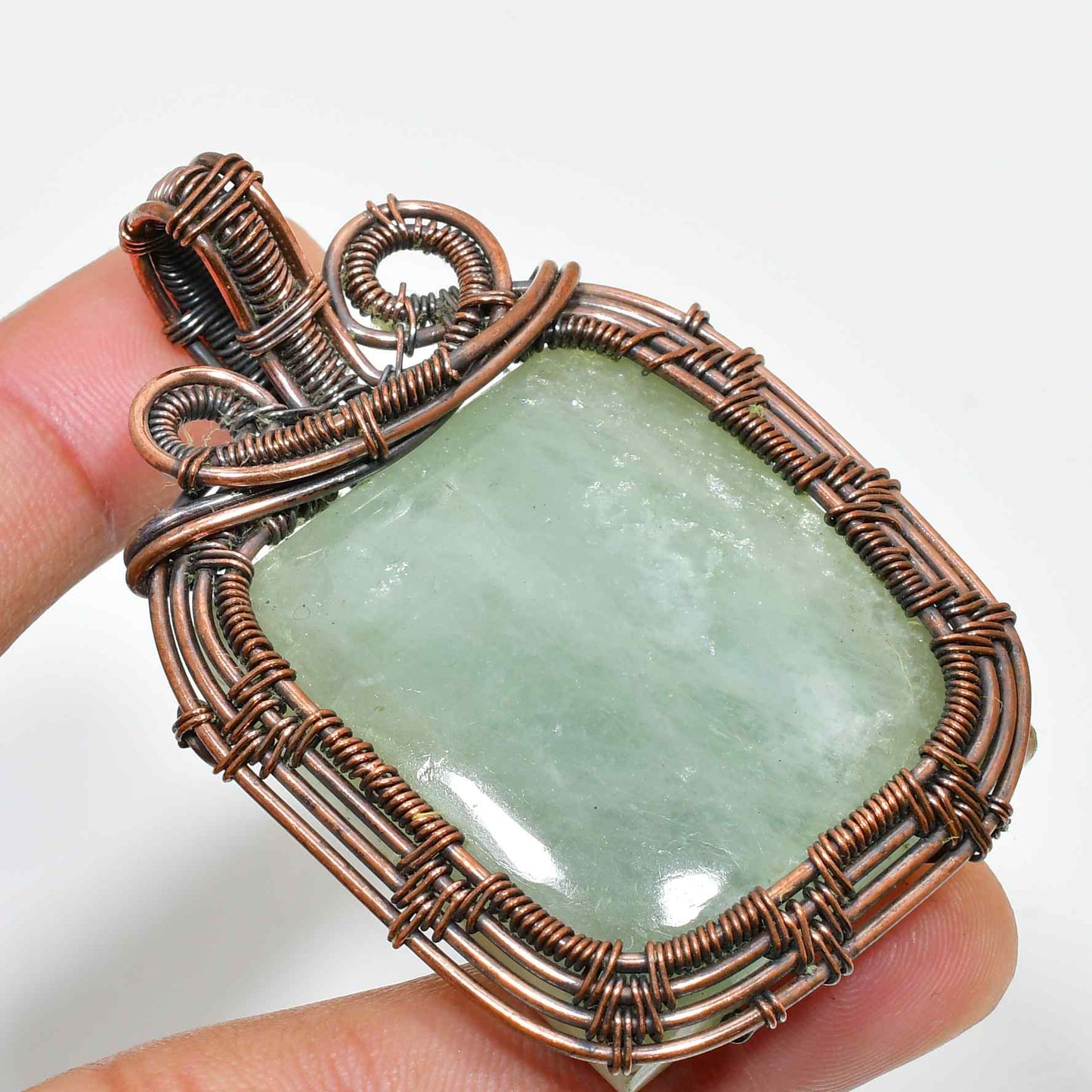 Serenity’s Embrace – Jade & Copper Harmony Pendant
