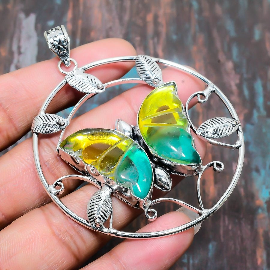 Luna’s Flutter – Aqua & Yellow Resin Butterfly Pendant