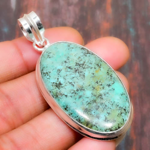 Serenity’s Embrace – Sterling Silver Turquoise Pendant