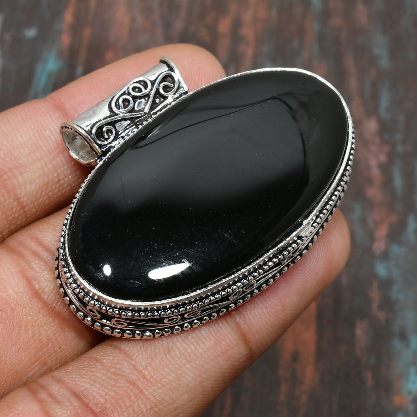Onyx Sentinel – Ornate Silver Pendant